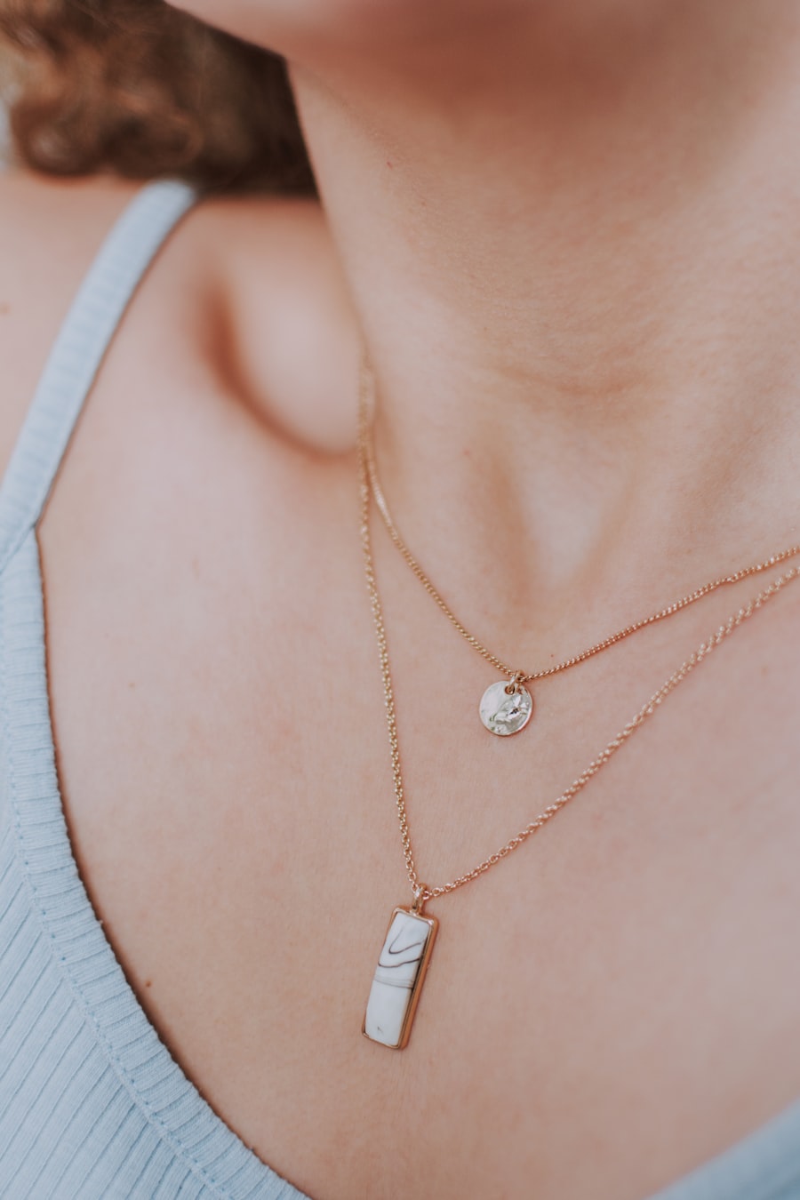 Customer photo wearing the layered pendant duo