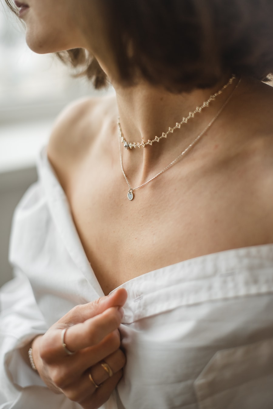 Customer photo wearing layered megems necklaces